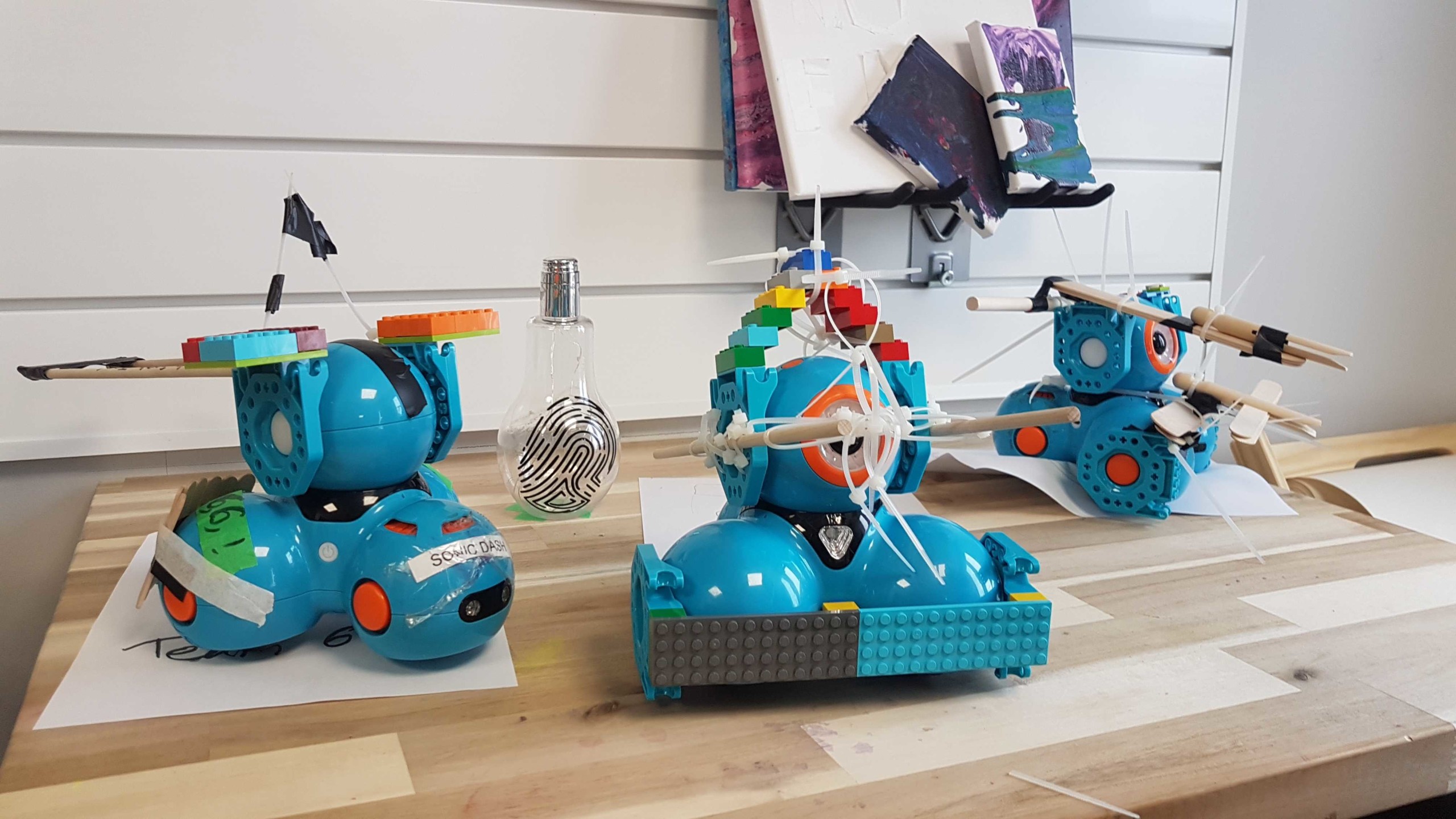Dash robotos on a table.