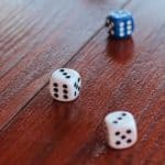 Dice rolled on a table.