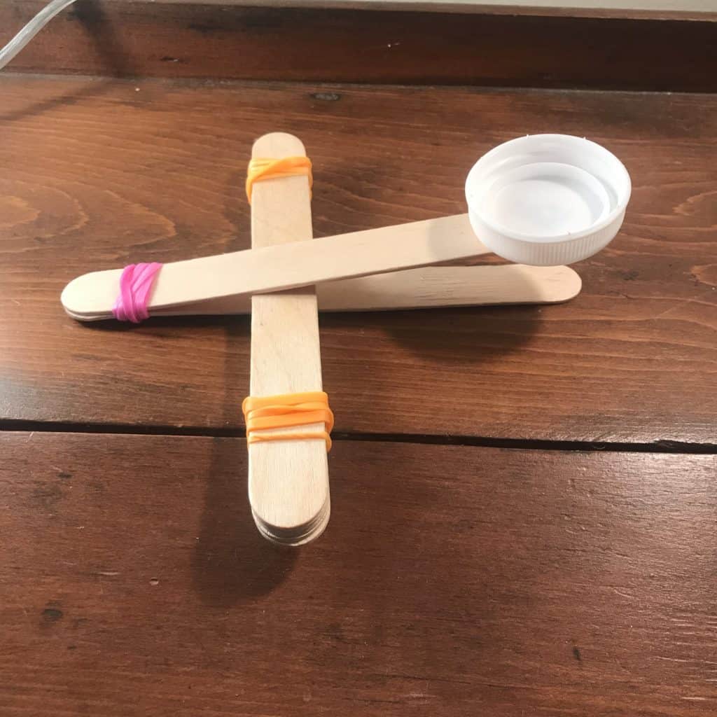 Step four of the catapult maker activity project.