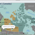 Block code in Scratch with Critter on a map of Nunavut saying "I want to go to Iqaluit!"