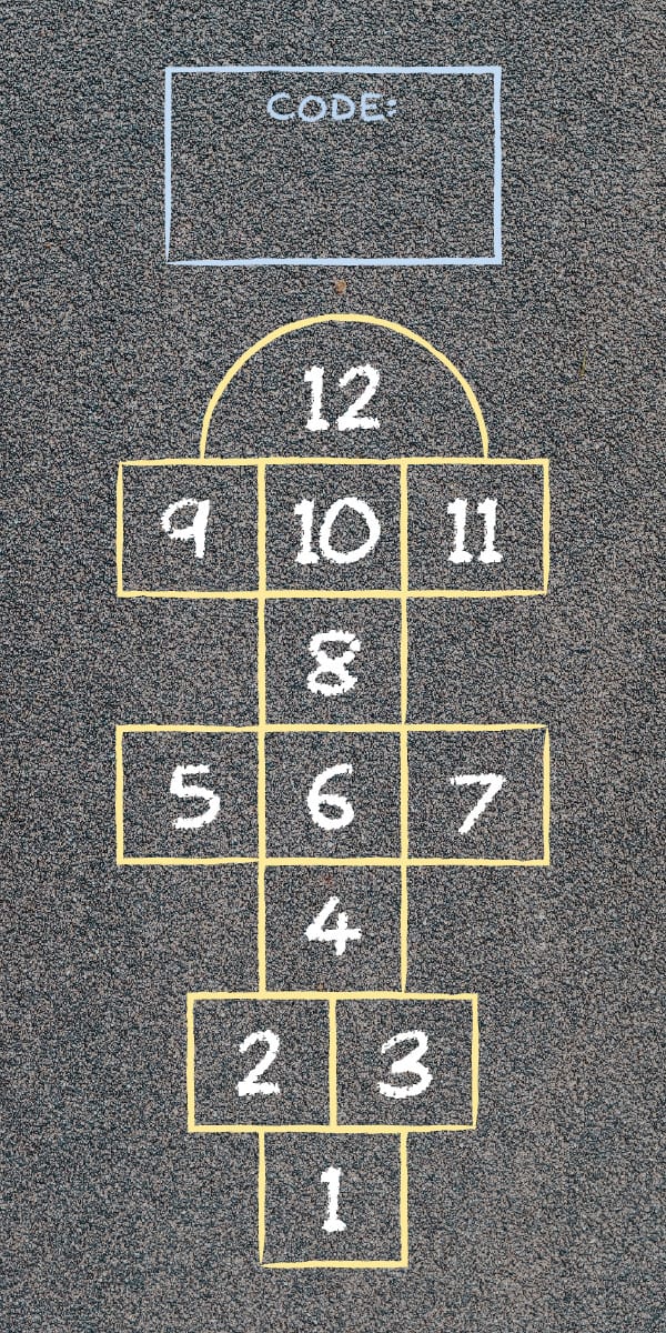 A hopscotch court drawn on pavement.