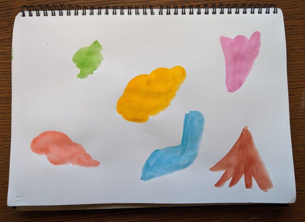 Paper with painted blobs.