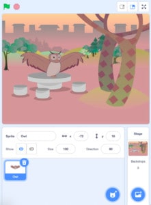 The scratch backdrop is displayed on the top half of the screen, with a pink background and an pwl in the middle with a tree along the side. The bottom half displays the buttons to set up your backdrop.