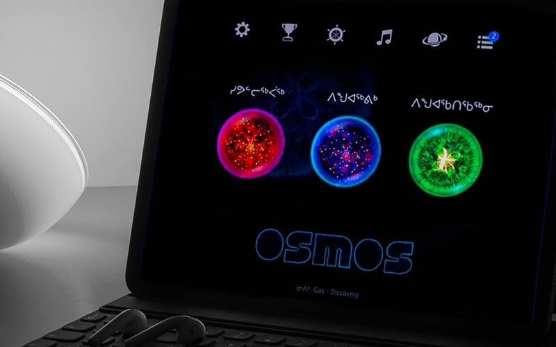 The Osmos app open on a tablet.