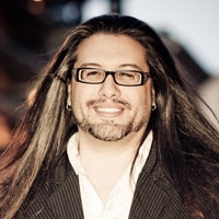 A portrait of John Romero.