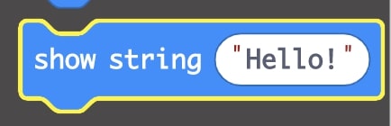 highlighted ‘show string “Hello”’ block